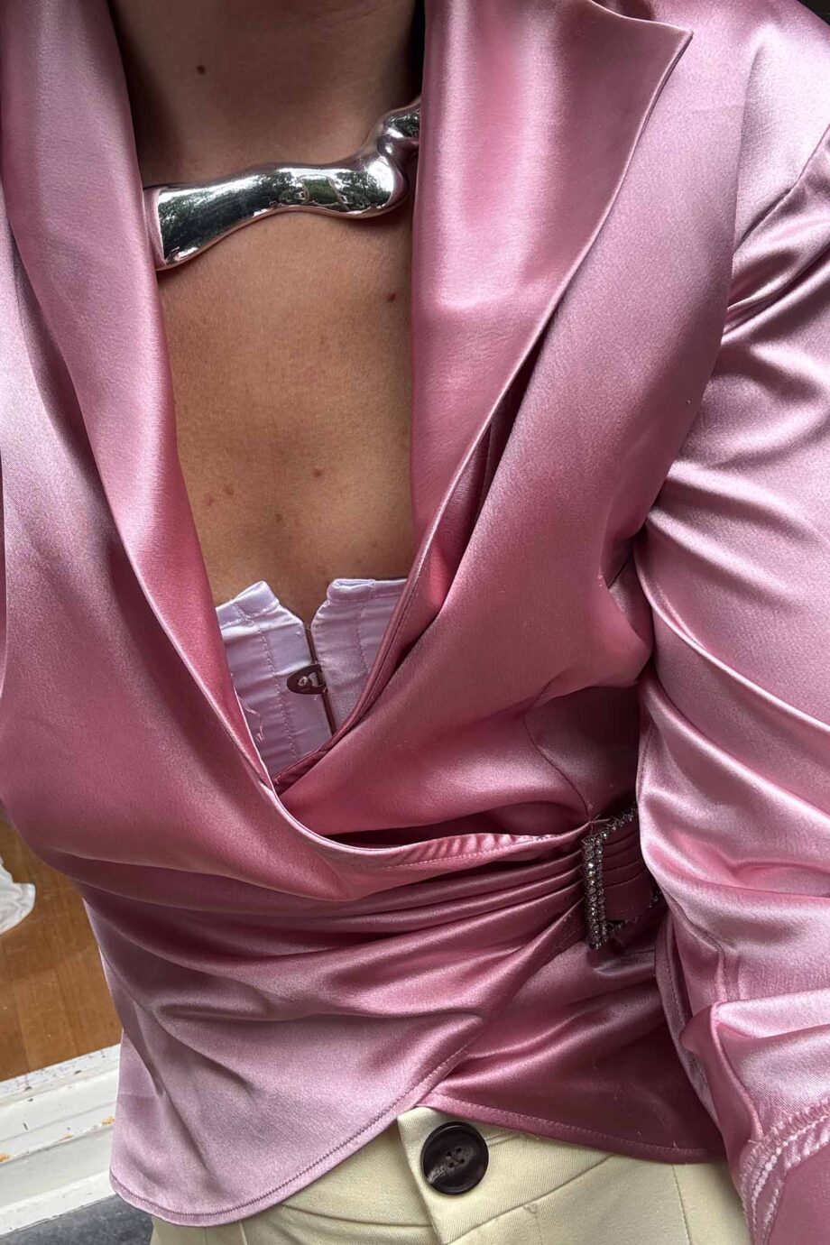 Rose draped satin silver buckle blouse