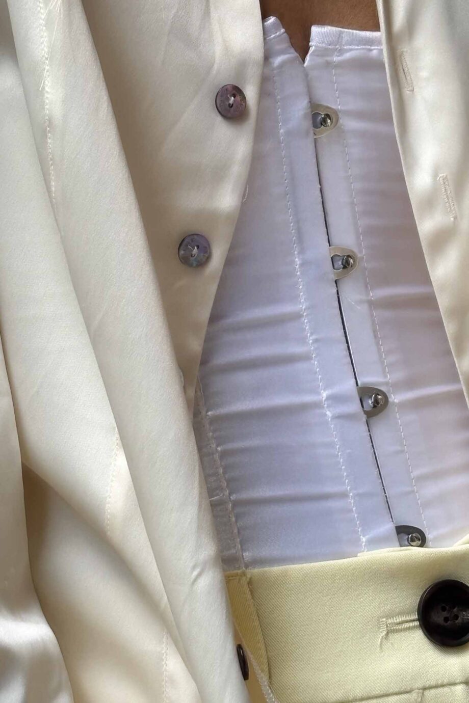 Crème de seta silk pearl button blouse