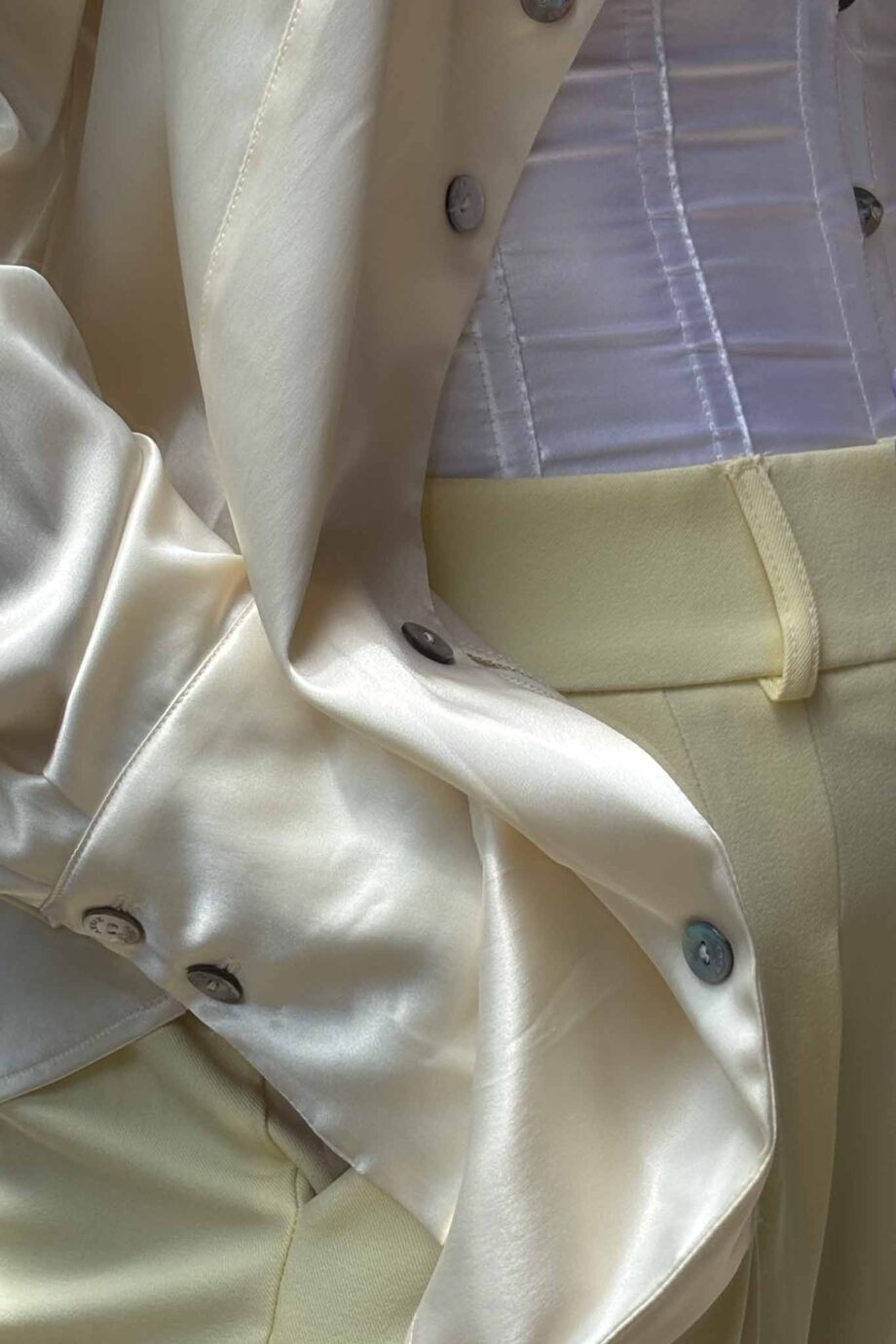 Crème de seta silk pearl button blouse