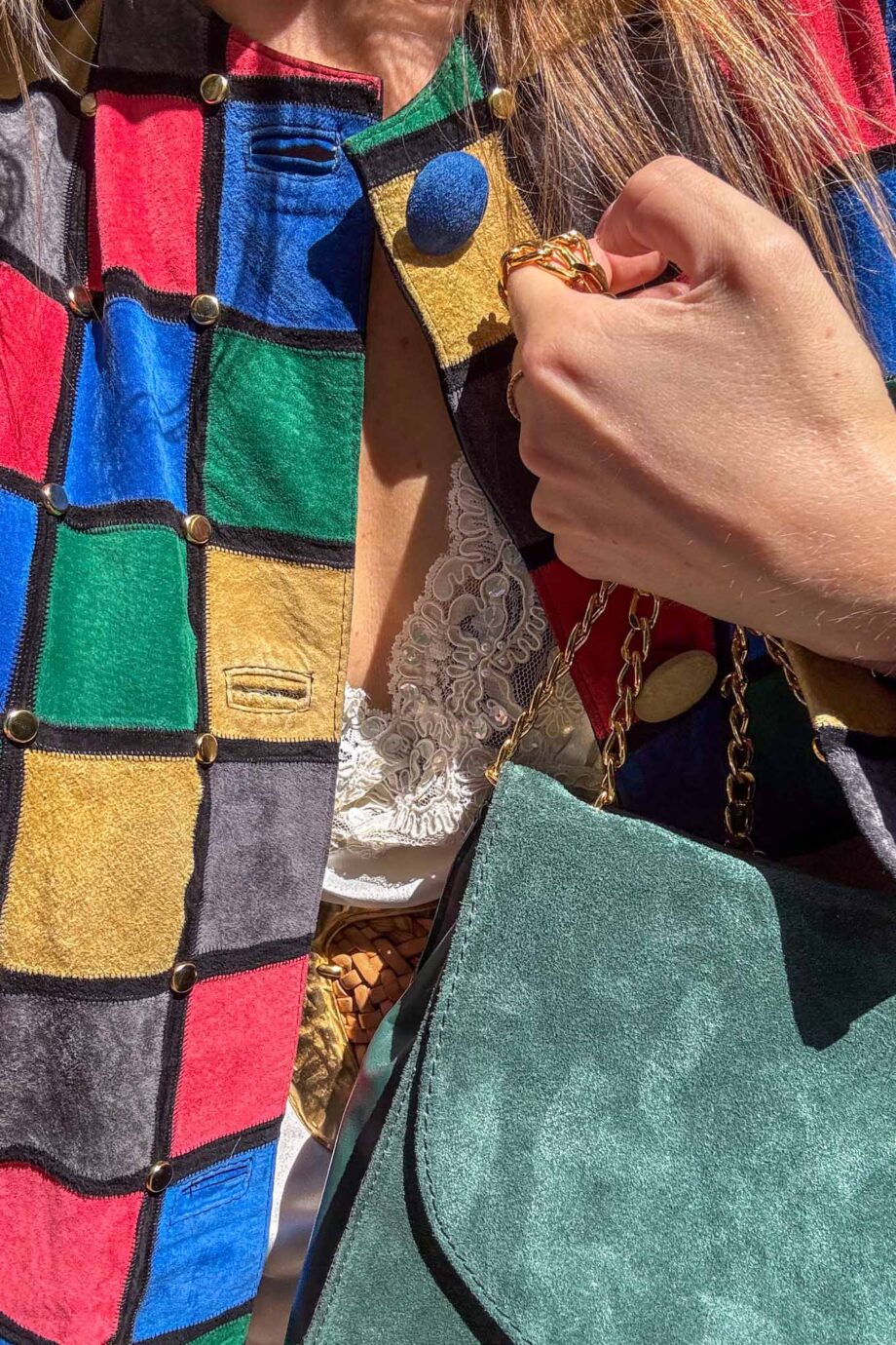 The patchwork suede golden studds jacket mondriaan inspired