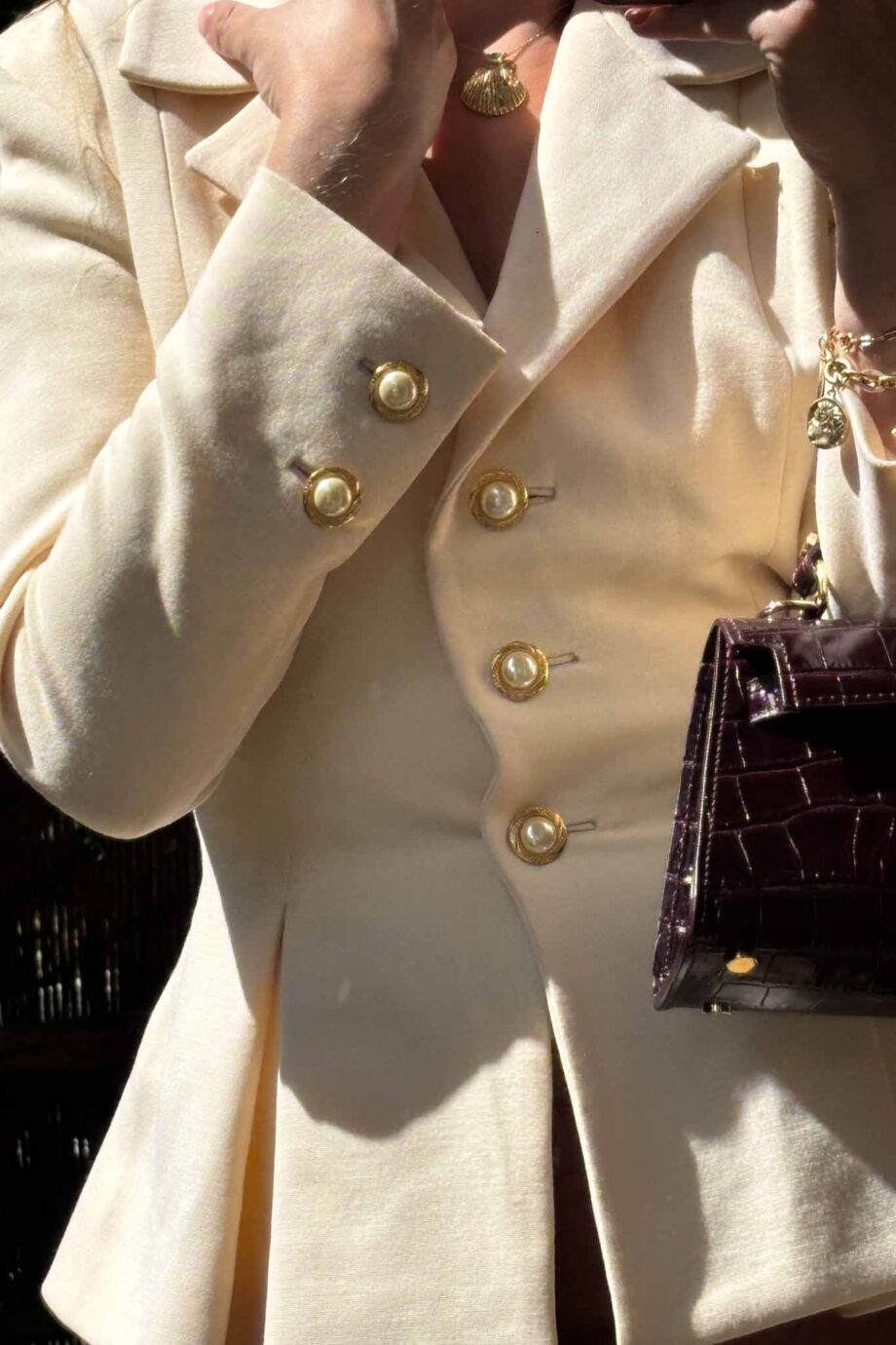 The vintage cream golden accents peplum blazer