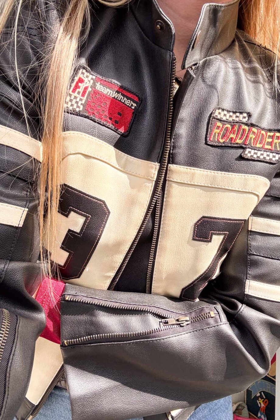 Car racing in 90s leather jacket