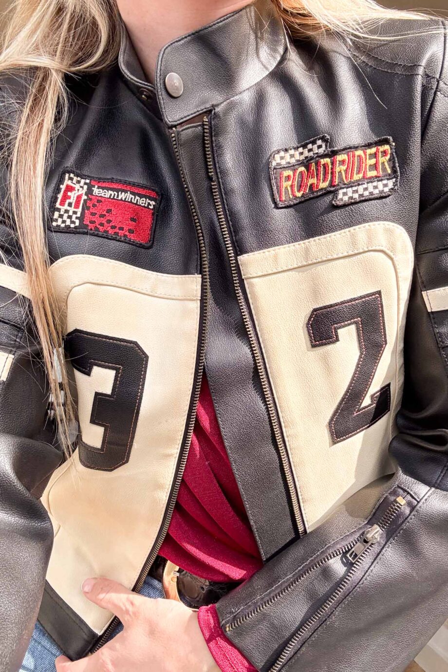 Car racing in 90s leather jacket