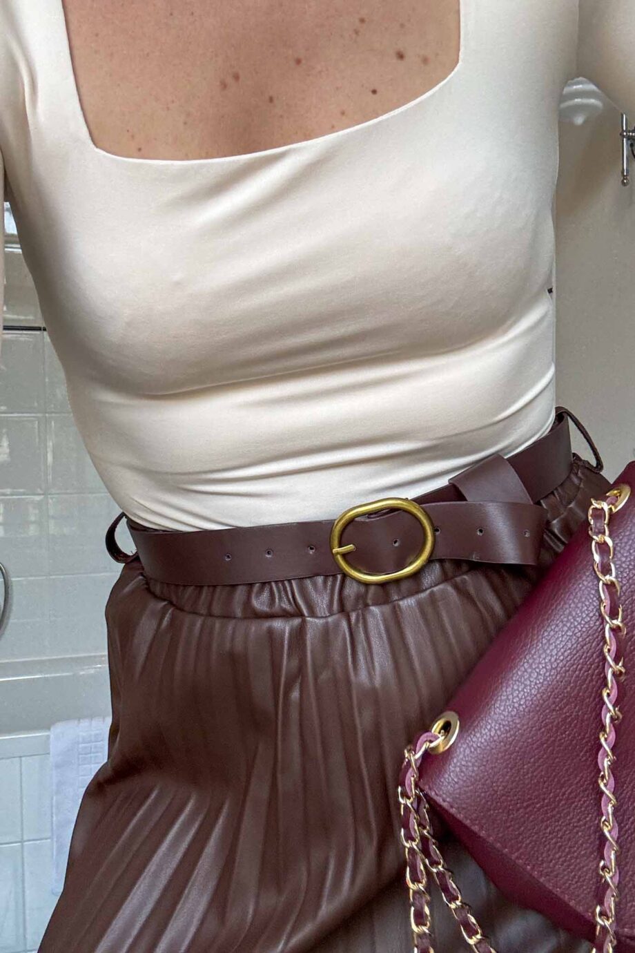 The taup toscana belted vegan leather skirt