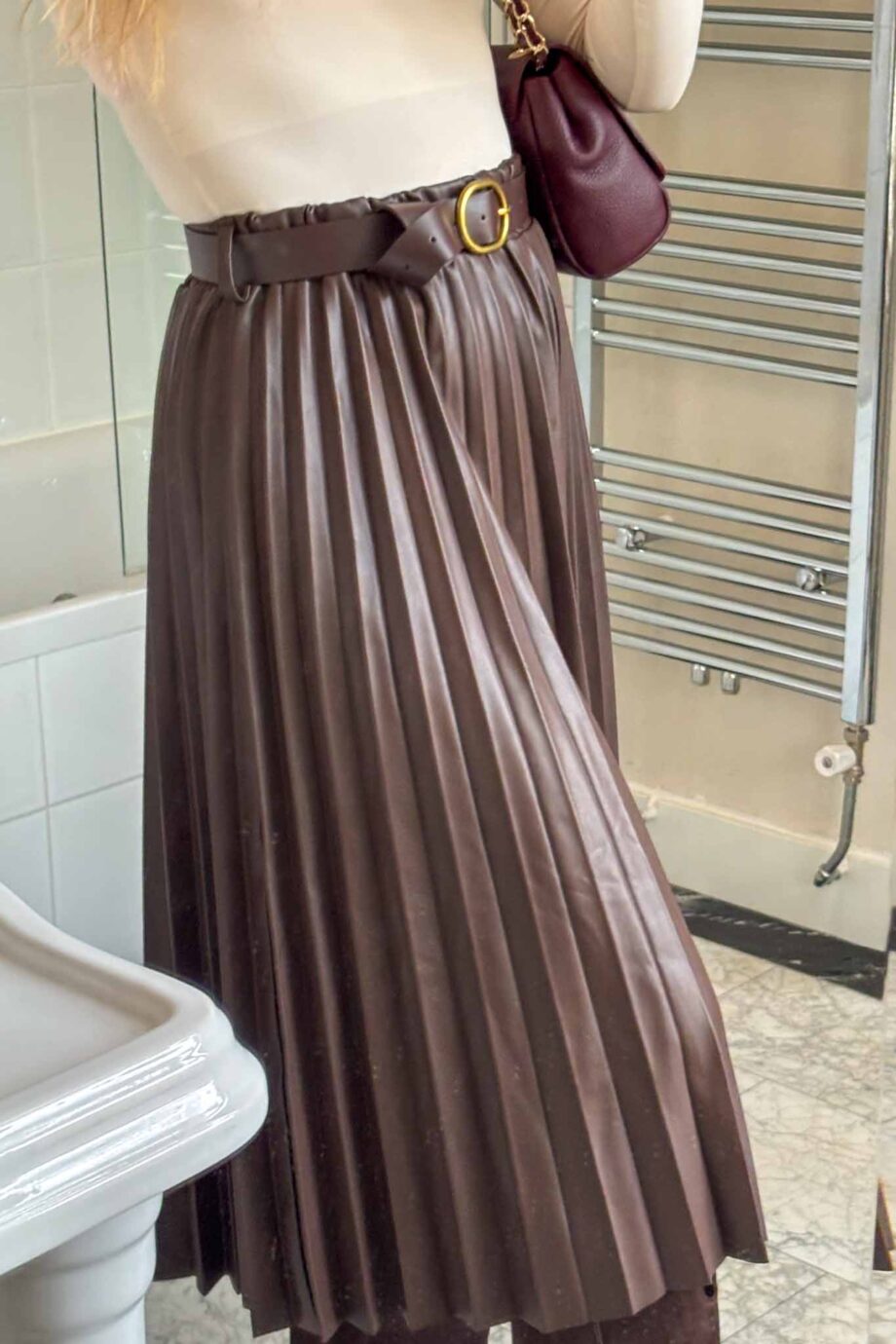 The taup toscana belted vegan leather skirt